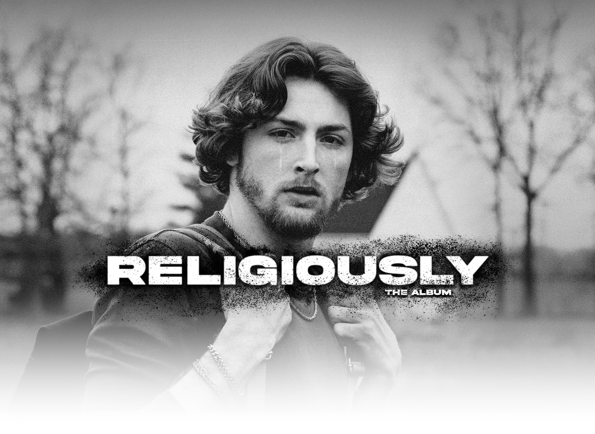 The cover art for ‘Religiously. The Album.’ Bailey Zimmerman looks into the camera while a tear streams down each eye.